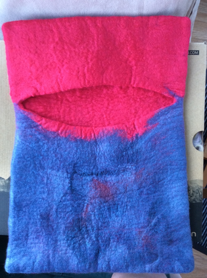 Inside view of rose and blue wet felted bag